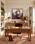 Sunrise Ruby framed canvas print in a refined home office