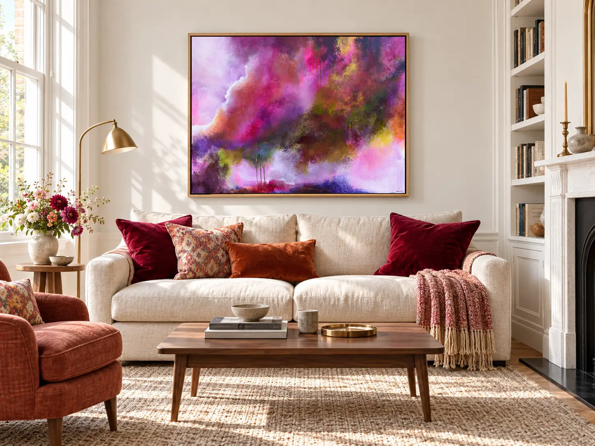 The Gift original painting by Nicola Bird displayed above a sofa in a living room
