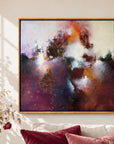 Sunrise Ruby framed canvas print, close-up in a light-filled living room