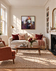 Sunrise Ruby framed canvas print in a light-filled living room