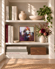 Sunrise Ruby 12-inch framed canvas print styled on a bookcase